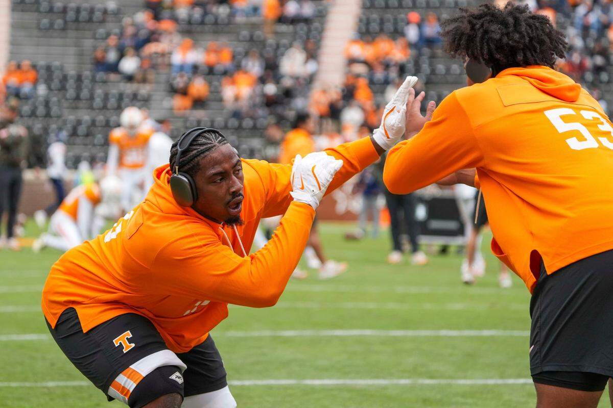 Tennessee defensive linemen Omarr Norman-Lott (left) and Daevin Hobbs (53) during warmups before a game between Tennessee and UTEP in Neyland Stadium on Saturday, November 23, 2024.