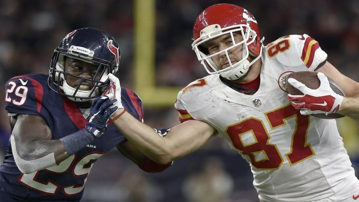Chiefs tight end Travis Kelce, right, signed a five-year contract extension on Friday that makes him the second-highest paid in the NFL at his position.