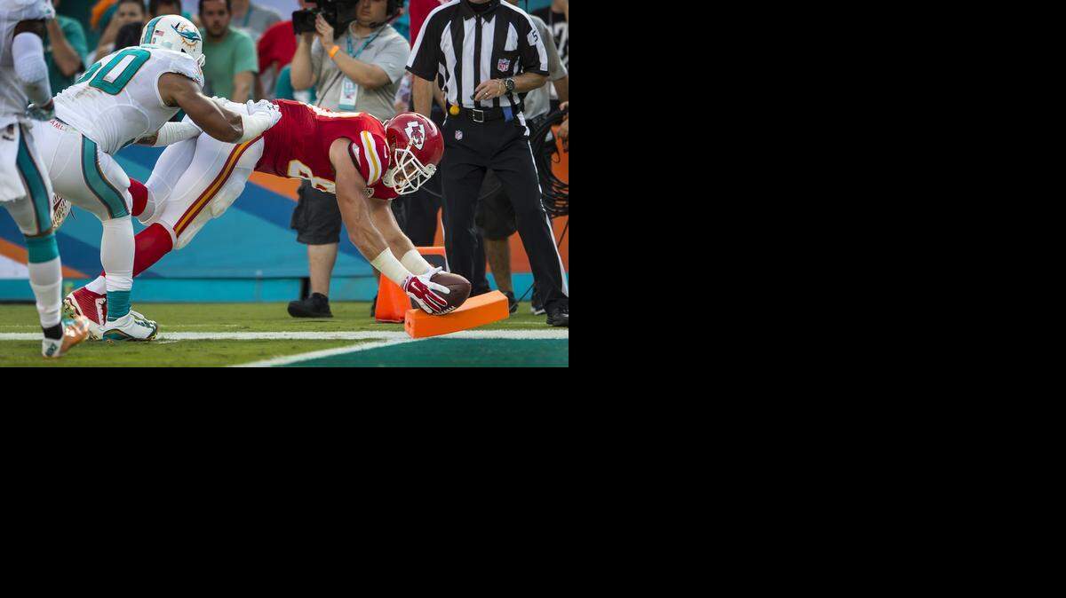 
Kansas City Chiefs tight end Travis Kelce (87) leaned over the goal line for a second quarter touchdown against the Miami Dolphins at Sun Life Stadium in Miami Gardens, Fla. on September 21, 2014. The Chiefs won 34-15.
