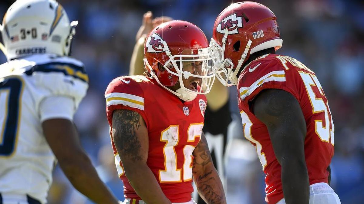 Kansas City Chiefs wide receiver Albert Wilson (12) was fired up for the special teams punt return tackle by teammate Kevin Pierre-Louis (57) against the Los Angeles Chargers on September 24, 2017 at StubHub Center in Carson, CA. The Chiefs won 24-10.