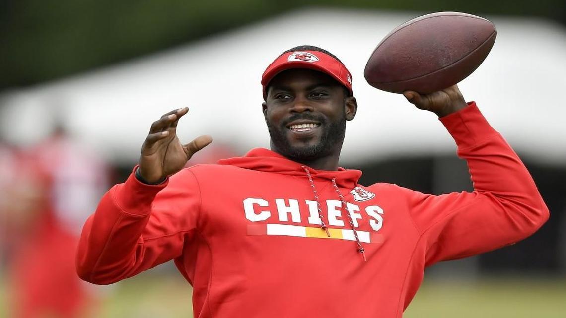 Kansas City Chiefs coaching intern Michael Vick threw the football with offensive coordinator Matt Nagy during a training-camp practice in St. Joseph, Mo.