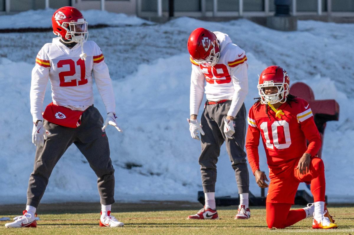 Kansas City Chiefs safety Jaden Hicks (21), cornerback Eric Scott (29) and running back Isiah Pacheco (10) stretch out during practice at the Chiefs’ training facility on Wednesday, Jan. 15, 2025, in Kansas City.