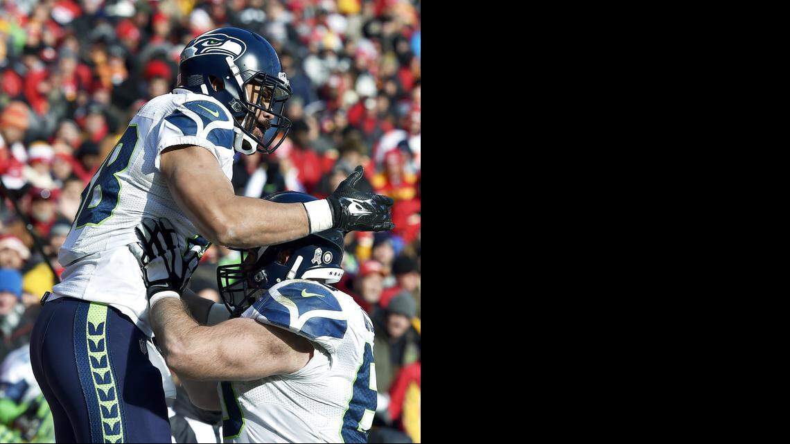 
Seattle Seahawks tight end Tony Moeaki (left) celebrates his third-quarter touchdown with center Max Unger on Sunday at Arrowhead Stadium. Moeaki is a former third-round draft pick by the Chiefs.
