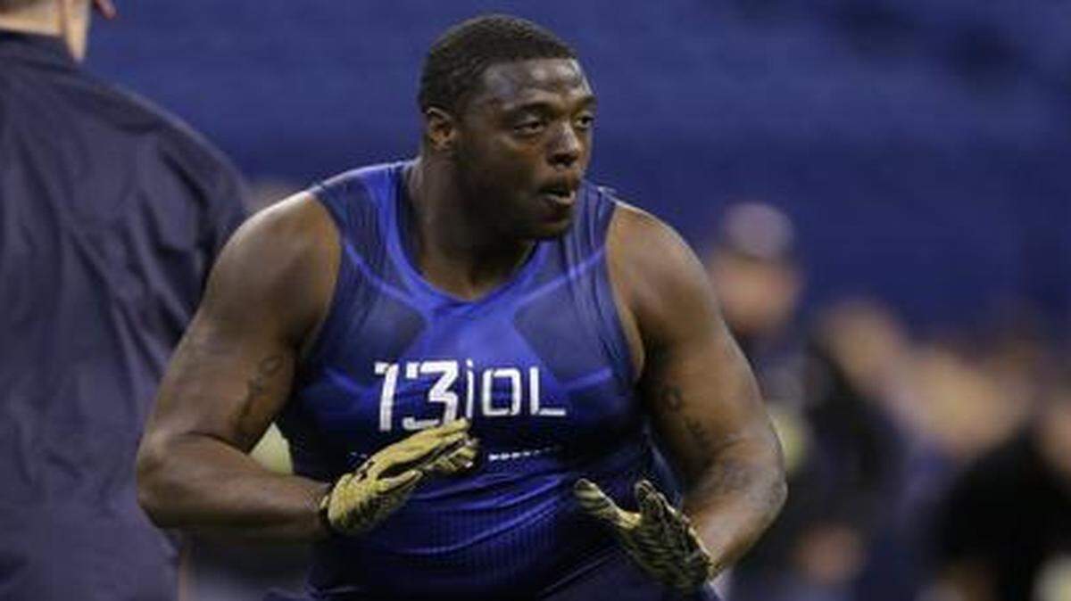 
Cameron Erving played defensive and offensive tackle before moving to center at Florida State.
