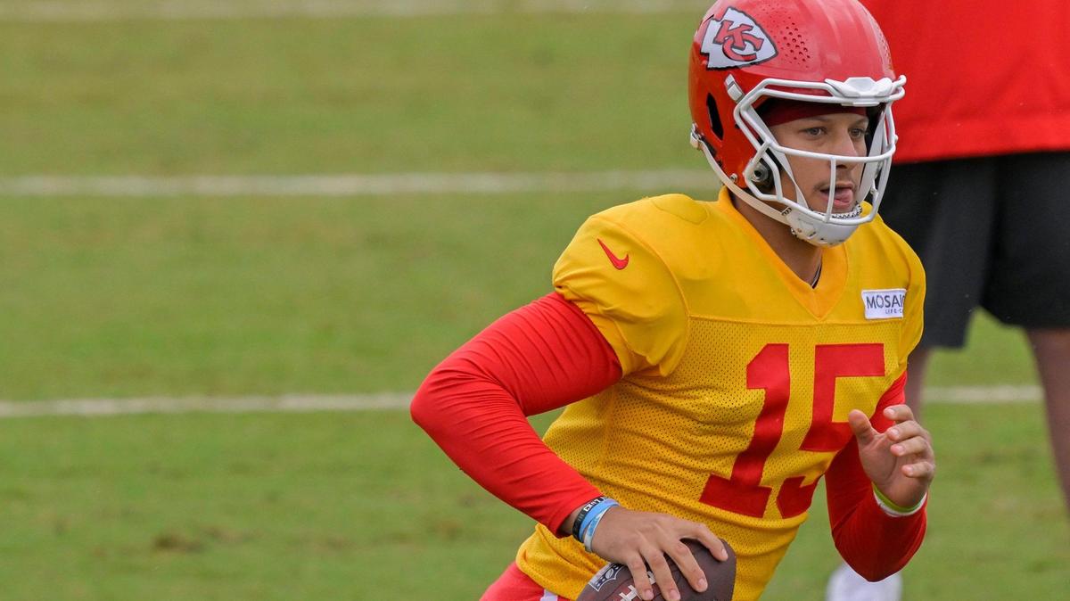 Chiefs quarterback Patrick Mahomes (15) looks for a receiver during training camp at Missouri Western State University on Friday, Aug. 4, 2023, in St. Joseph, Missouri.