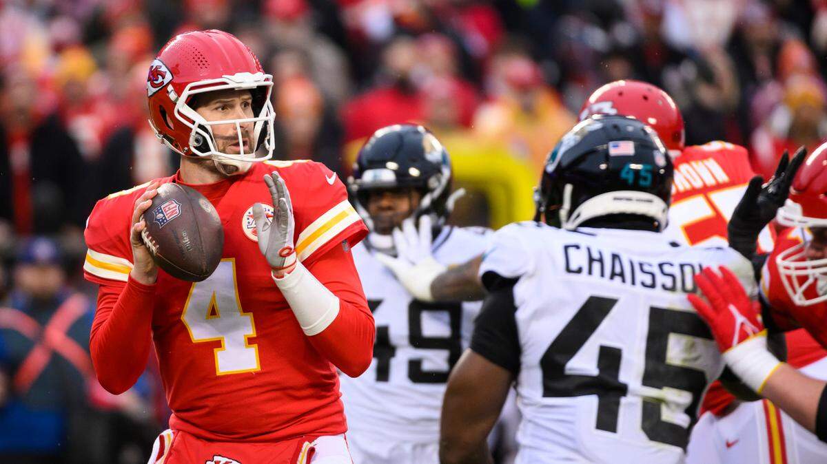 Kansas City Chiefs quarterback Chad Henne (4) looks to throw against the Jacksonville Jaguars during the first half of an NFL divisional round playoff football game, Saturday, Jan. 21, 2023 in Kansas City, Mo.