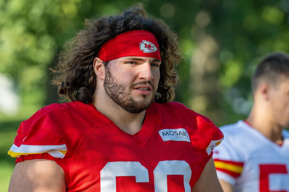 Kansas City Chiefs center Hunter Nourzad (60) walks down to the field for practice at Chiefs training camp on Thursday, July 18, 2024, in St. Joseph.