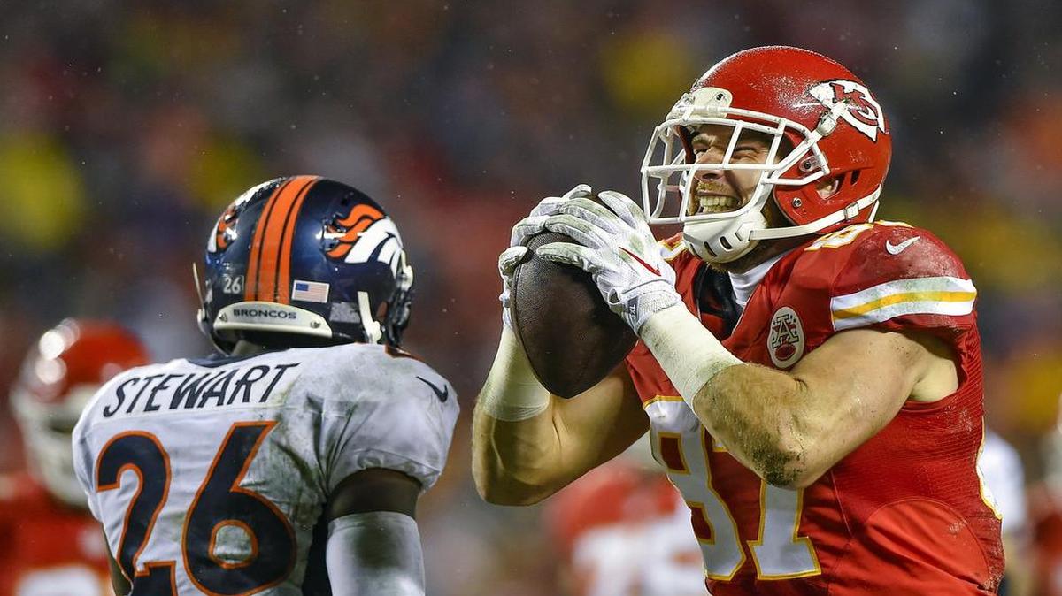 Kansas City Chiefs tight end Travis Kelce (87) celebrated a long run on Sunday during the first quarter of the NFL football game against the Denver Broncos at Arrowhead Stadium in Kansas City. The Kansas City Chiefs defeated the Denver Broncos 33-10.