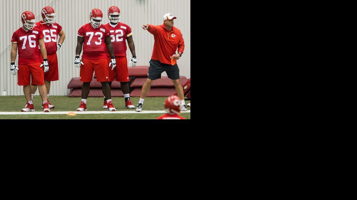 
Kansas City Chiefs offensive linemen Laurent Duvernay-Tardif (76) and Zach Fulton (73) listened to instructions during the first day of Chiefs rookie minicamp at the Arrowhead practice facility Saturday.
