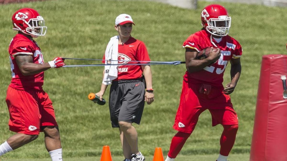
Chiefs running back Jamaal Charles (25) worked on fumble drills at the beginning of organized team activities (OTA's) Tuesday at the Arrowhead Stadium practice facility.
