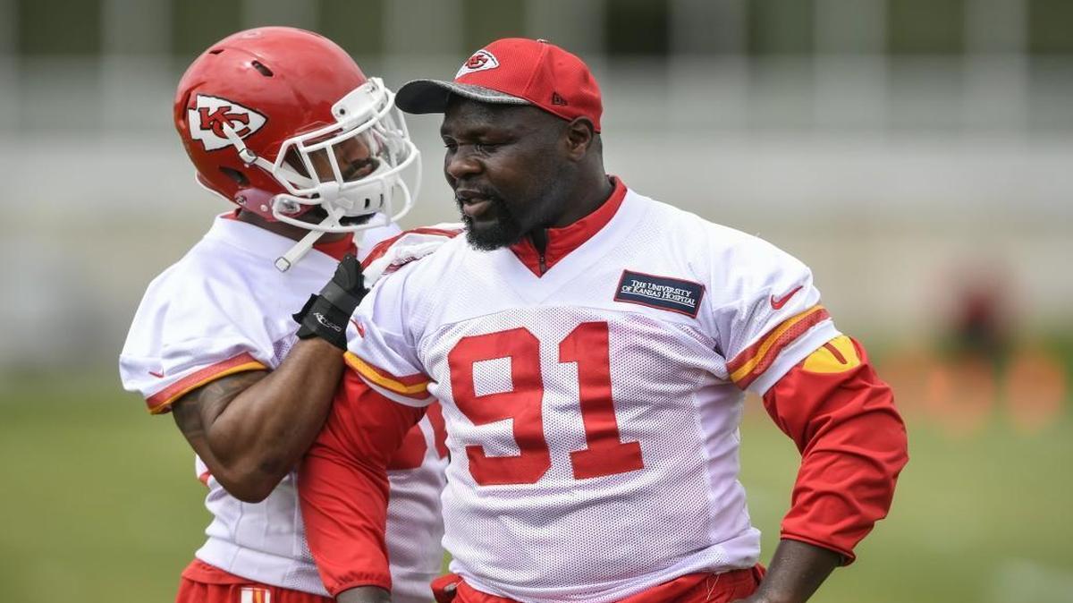 Veteran Chiefs outside linebacker Tamba Hali, right, wants to play again next season.