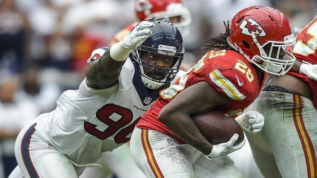 Texans outside linebacker Jadeveon Clowney (left) chased down the Chiefs’ Jamaal Charles in the season opener but won’t play in Saturday’s AFC playoff game.