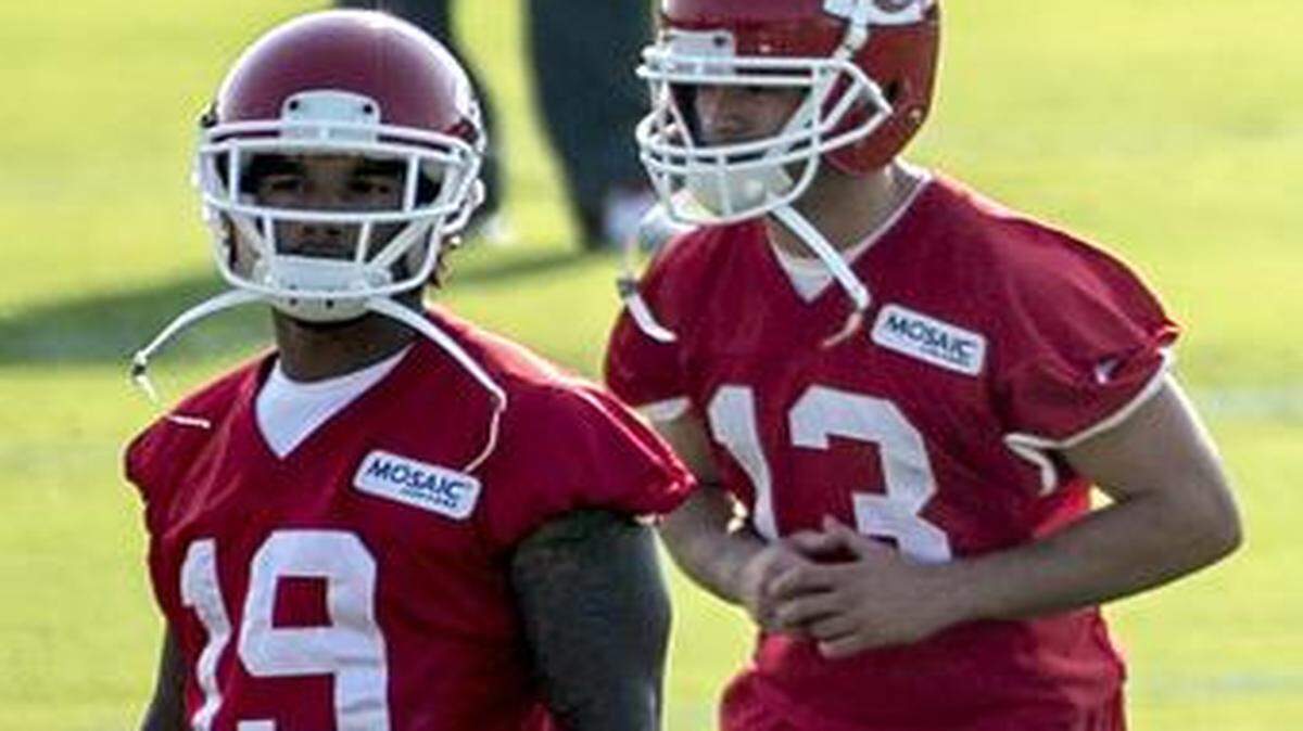 
Chiefs wide receiver Kyle Williams (left) stretched with his teammates on Tuesday morning during Chiefs training camp in St. Joseph.
