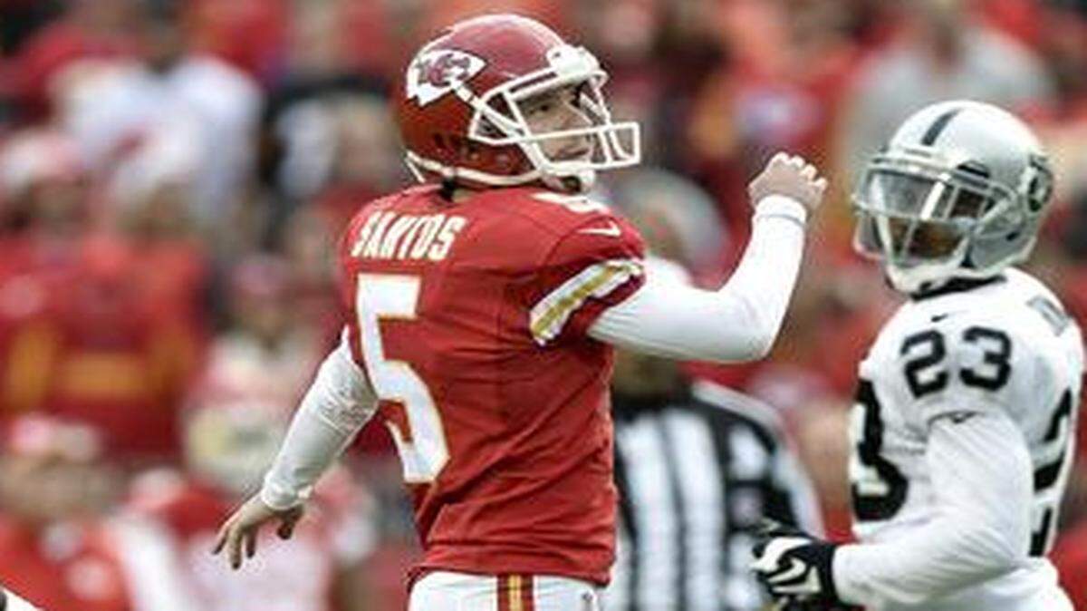 
Kansas City Chiefs kicker Cairo Santos (5) watches his missed fourth quarter field goal between Oakland Raiders' D.J. Hayden (25) and Tarell Brown (23) during Sunday's football game on December 14, 2014 at Arrowhead Stadium in Kansas City, Mo.
