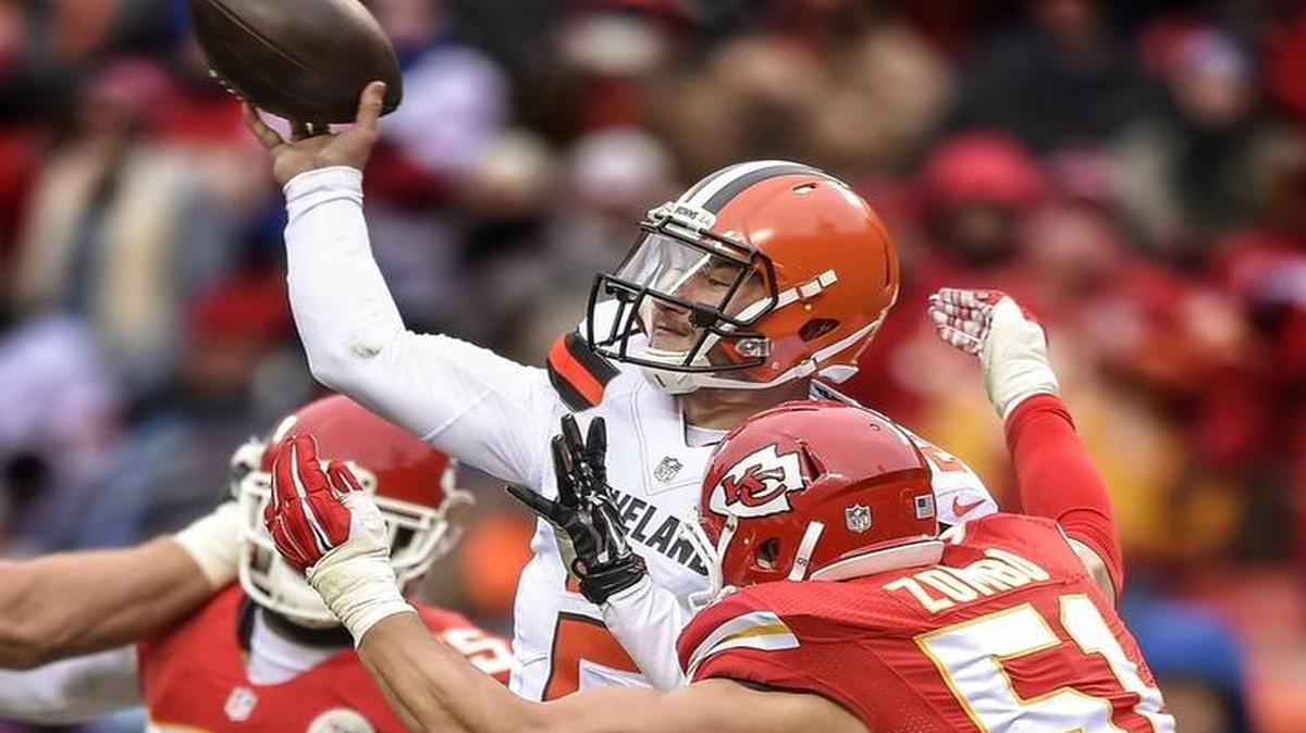 Kansas City Chiefs outside linebacker Frank Zombo hit Cleveland Browns quarterback Johnny Manziel as he threw a pass during a game in December.
