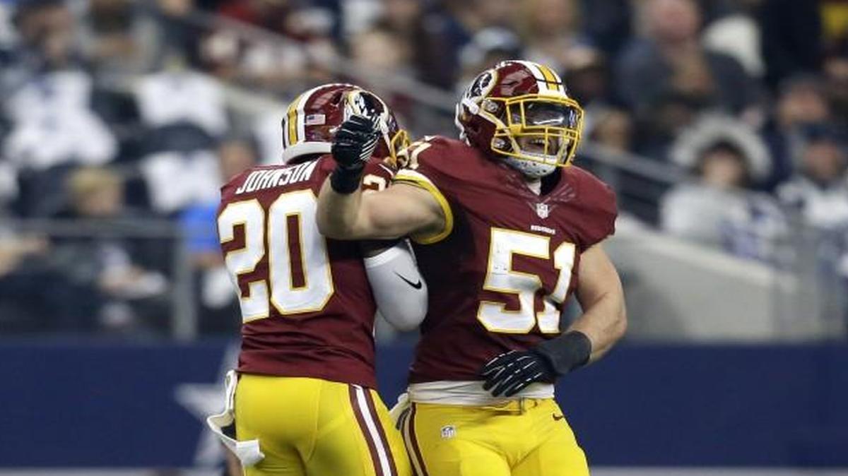 While with Washington last season, Jeron Johnson (left) celebrated a big play with Will Compton.