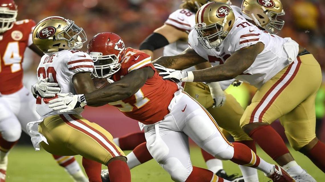 Chiefs defensive lineman Allen Bailey stuffed San Francisco 49ers running back Carlos Hyde for a 2-yard loss in the first quarter during NFL preseason action at Arrowhead Stadium on August 11, 2017.