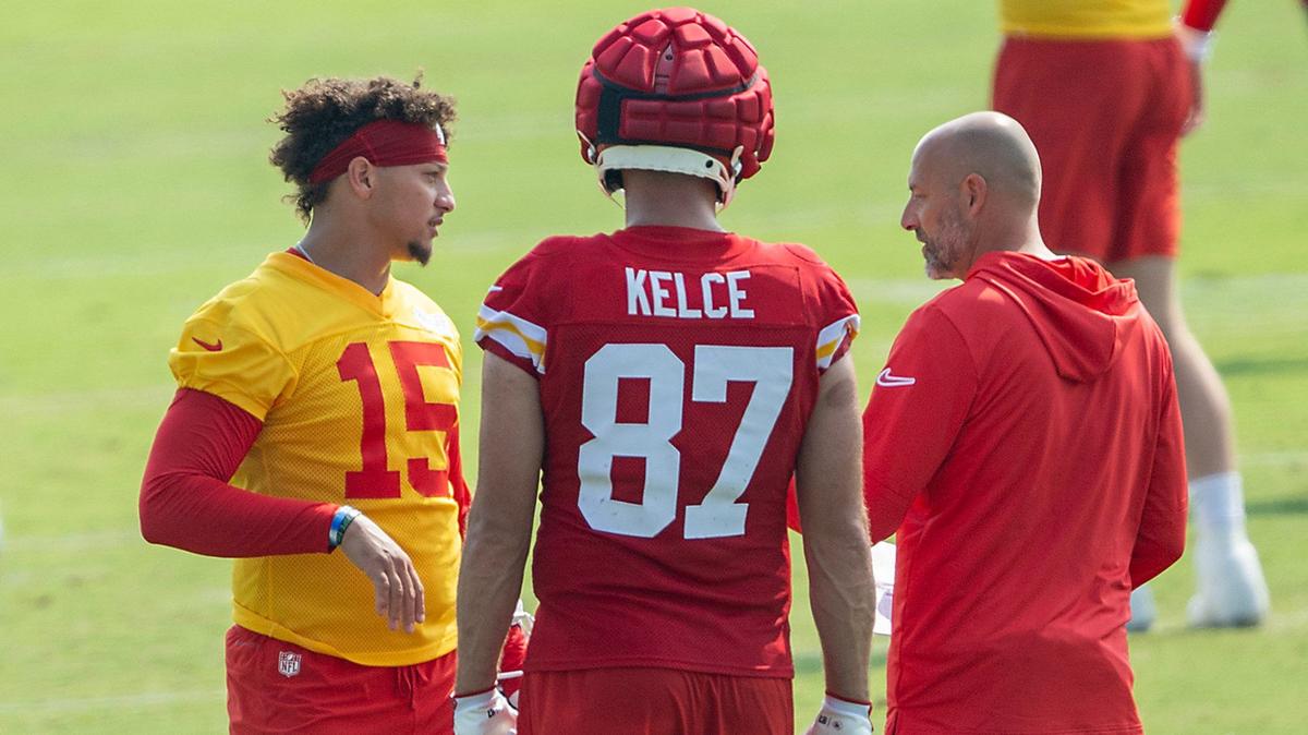 Chiefs quarterback Patrick Mahomes (15) and tight end Travis Kelce (87) talk with Chiefs offensive coordinator Matt Nagy during training camp at Missouri Western State University on Wednesday, July 24, 2024, in St. Joseph.