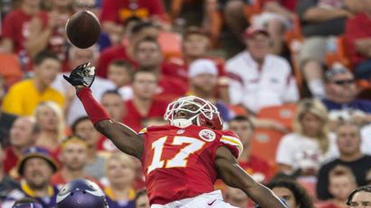 
Kansas City Chiefs wide receiver Donnie Avery (17) tried to catch a pass in front of Minnesota Vikings defensive back Robert Blanton on August 23, 2014, at Arrowhead Stadium in Kansas City, Mo.
