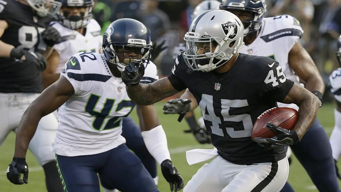 Running back George Atkinson III, who was signed to the Chiefs’ practice squad on Tuesday, carried the ball against the Seahawks in a preseason game on Aug. 31.