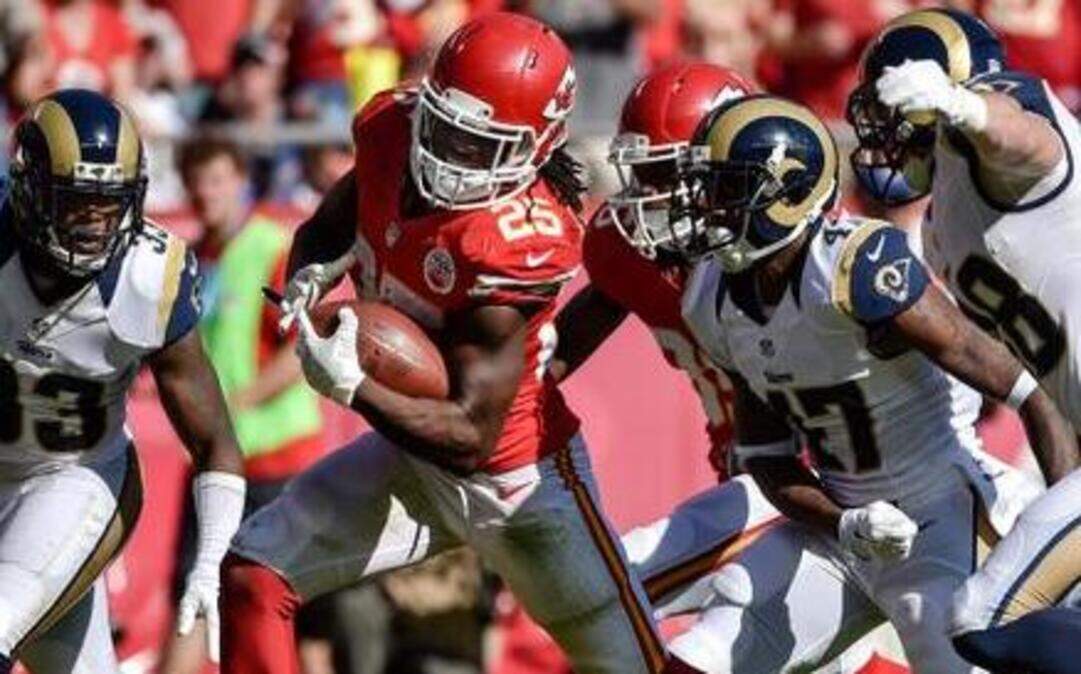 
Chiefs running back Jamaal Charles (25) eluded the St. Louis Rams’ defense on his way to scoring a touchdown Sunday at Arrowhead Stadium. The Chiefs racked up 34 carries for 143 rushing yards, 129 of which came in the second half. on their way to a 34-7 victory. 
