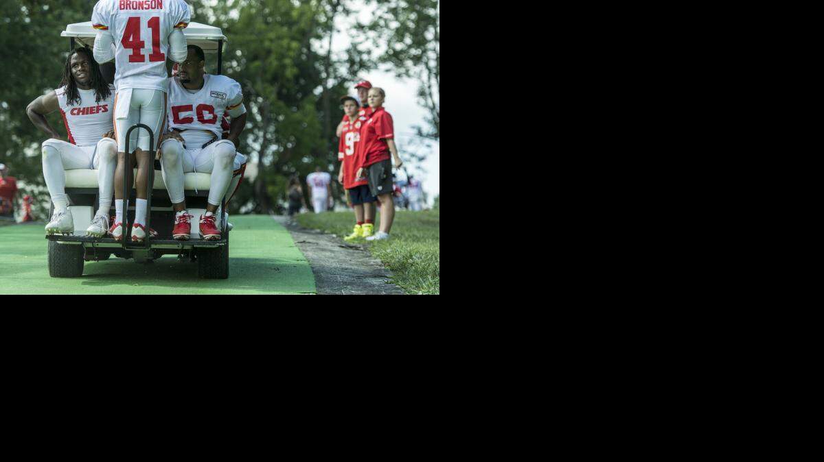 
Kansas City Chiefs running back Jamaal Charles (left) and linebacker Derrick Johnson (right), with safety Malcolm Bronson (center), hitched a golf cart ride after practice last Monday at training camp at Missouri Western State University in St. Joseph, Mo.
