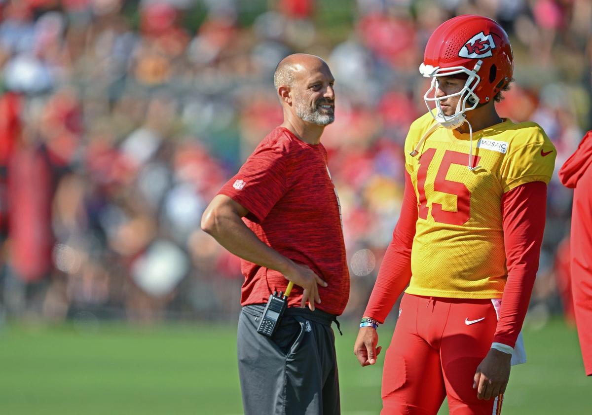 Chiefs offensive coordinator Matt Nagy, left, checks in with quarterback Patrick Mahomes during a training camp practice at Missouri Western State in St. Joseph on Aug. 5, 2024.