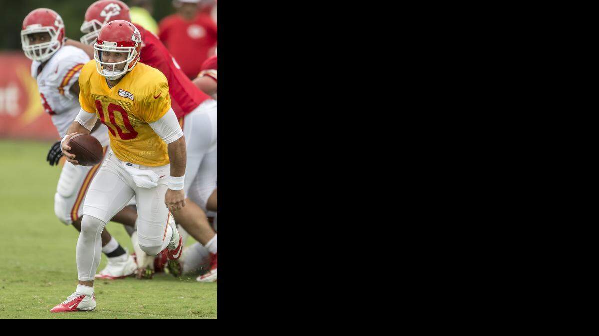 
Quarterback Chase Daniel scrambled on a run Monday morning at Chiefs training camp.


