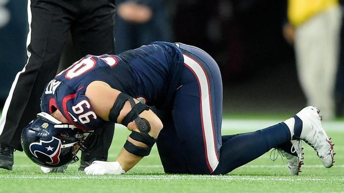 Texans defensive end J.J. Watt was in pain on the field after being injured in the second quarter during Saturday’s game in Houston.