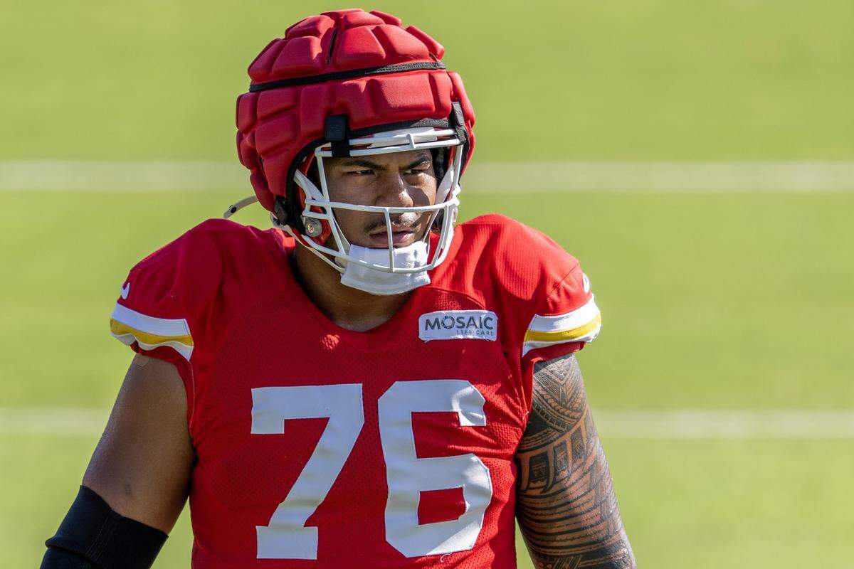 Kansas City Chiefs tackle Kingsley Suamataia (76) stretches during training camp at Missouri Western State University on Tuesday, July 29, 2025, in St. Joseph.