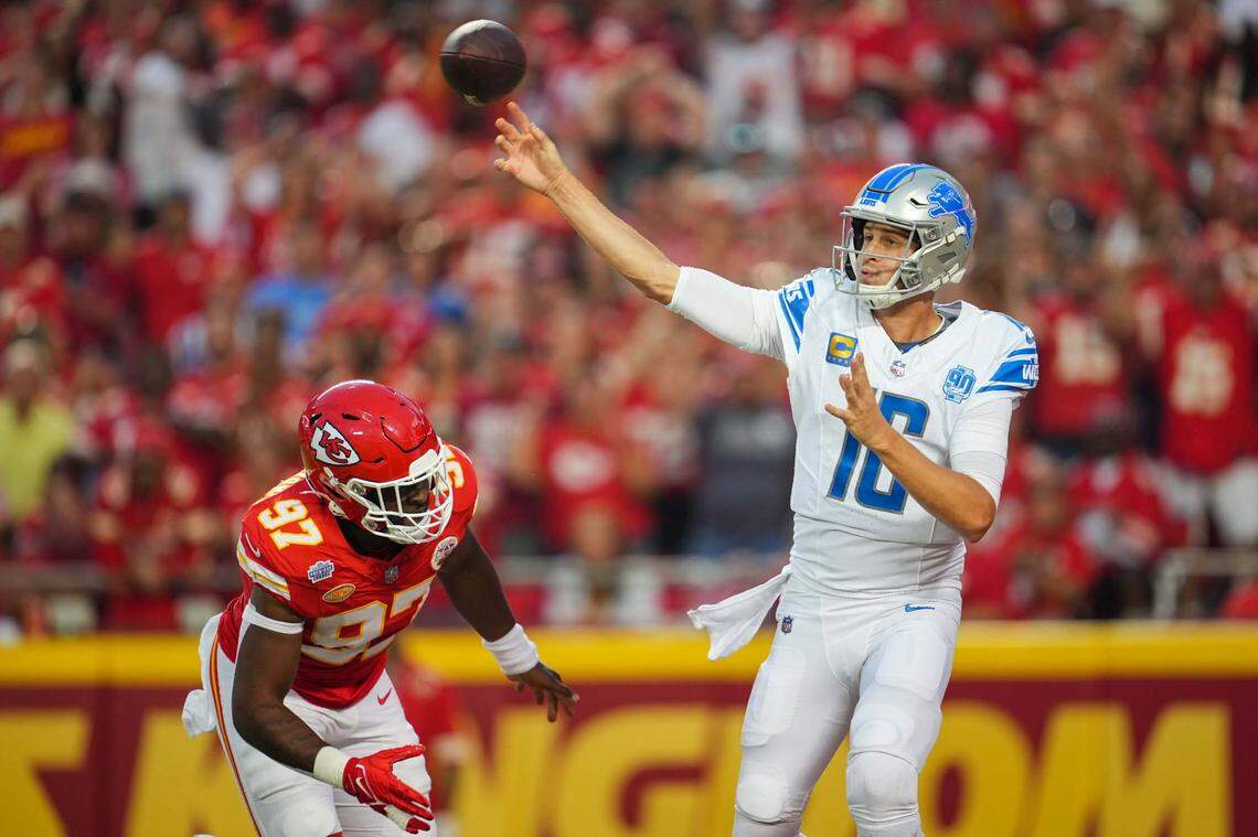 Detroit Lions quarterback Jared Goff (16) throws a pass against Kansas City Chiefs defensive end Felix Anudike-Uzomah (97) during the first half at GEHA Field at Arrowhead Stadium.
