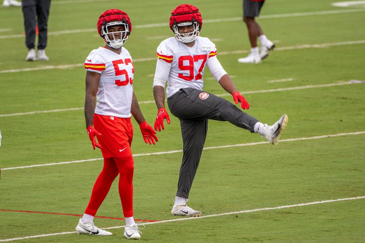 Kansas City Chiefs defensive end BJ Thompson (53), left, warms up with Felix Anudike-Uzomah (97) during practice at Chiefs training camp on Monday, July 31, 2023, in St. Joseph, Mo.
