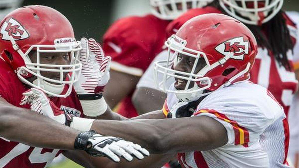 
Chiefs offensive linesman Donald Stephenson (79) faced off with linebacker Justin Houston (50) during drills on Saturday morning at summer training camp at Missouri Western State University in St. Joseph.
