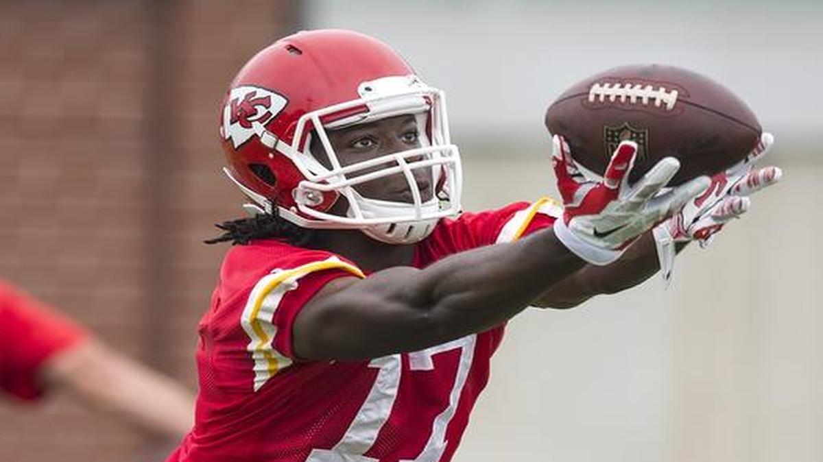 
Kansas City Chiefs wide receiver Chris Conley reached for a pass catch during position drills on Friday morning during organized team activities at the Arrowhead Stadium practice facility.
