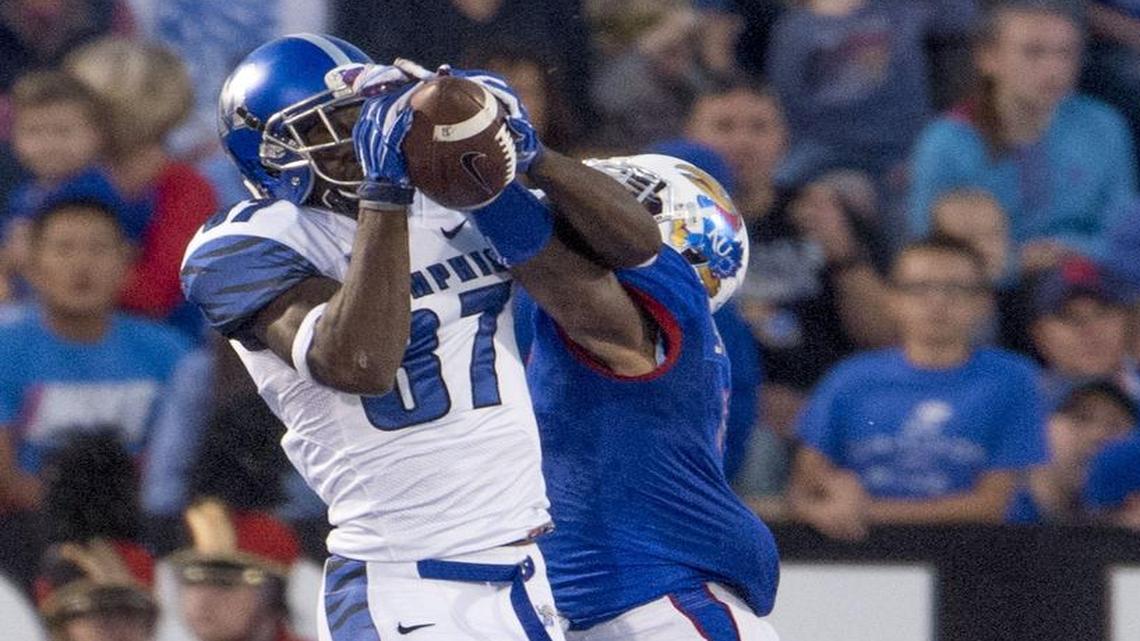 Wide receiver Tevin Jones (left), who signed with the Chiefs on Monday, was playing for Memphis when he caught a touchdown pass against Kansas in 2015.