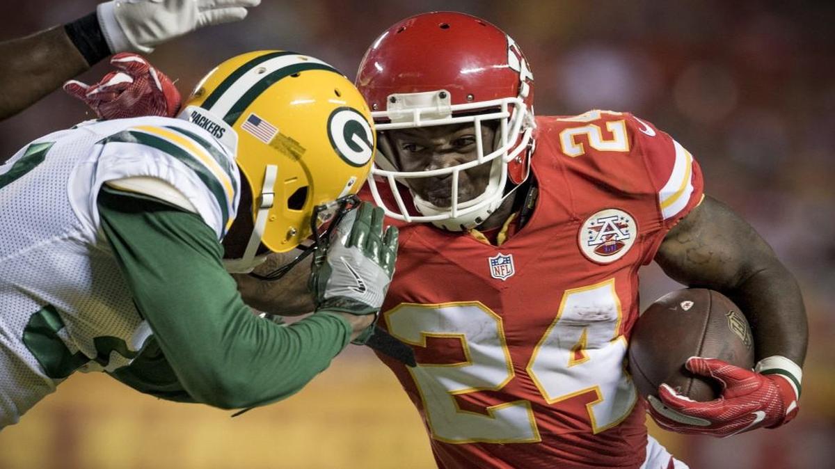 Packers cornerback Demetri Goodson looked to tackle Kansas City Chiefs running back Darrin Reaves (24) in a preseason football game at Arrowhead Stadium on Sept. 1, 2016.
