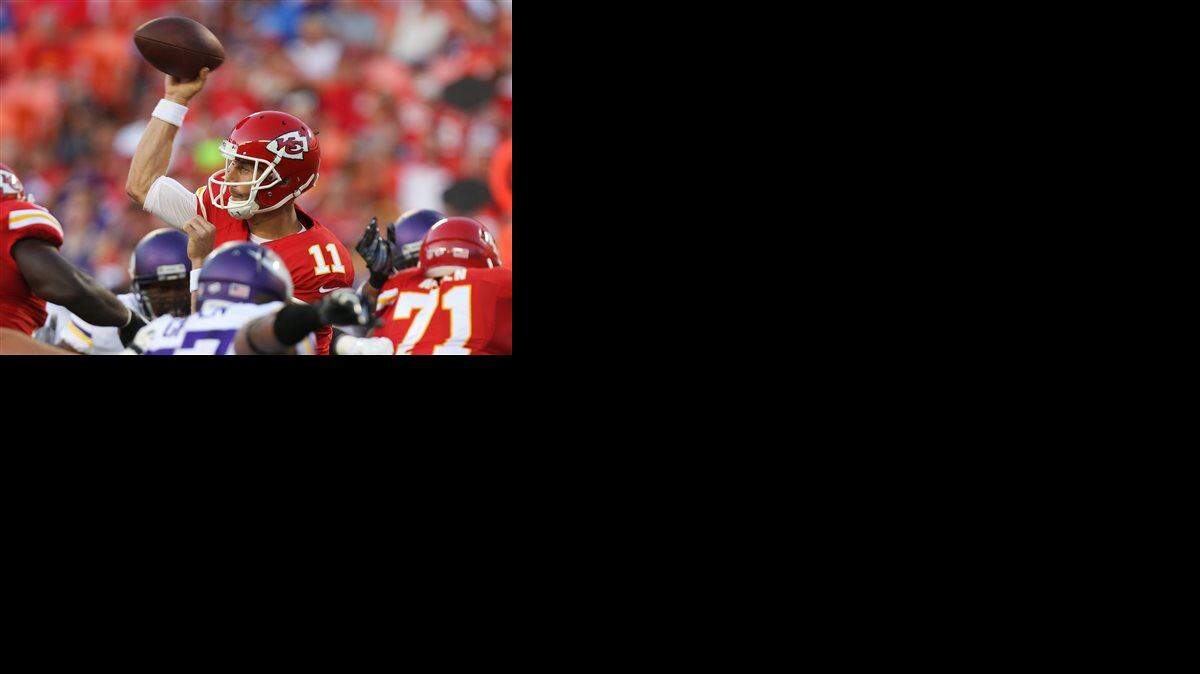 
Kansas City Chiefs quarterback Alex Smith (center) threw this pass against the Minnesota Vikings in the first half of Saturday’s preseason game. 
