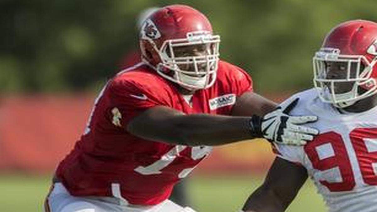 
Chiefs offensive lineman Donald Stephenson, left, worked against defensive tackle Jaye Howard during training camp.
