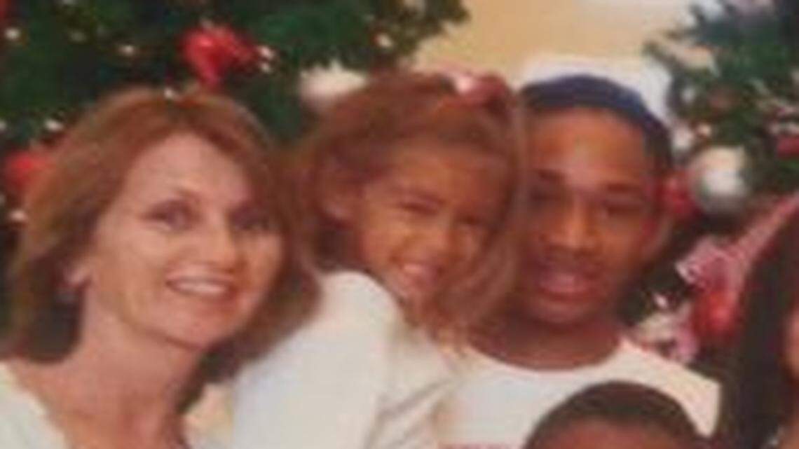 
Rose (left) and Brian Bailey (far right) of Port St. Lucie, Fla., have adopted eight foster children, including Chiefs receiver Albert Wilson (back row on left, holding little girl).
