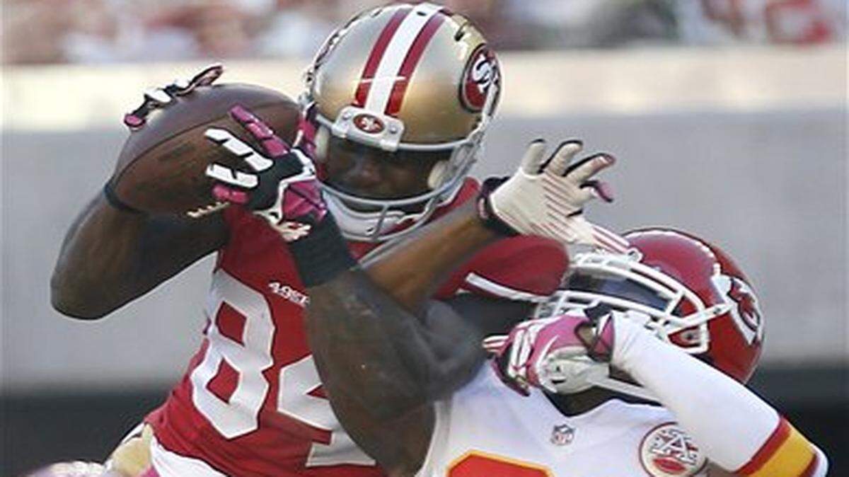 
San Francisco 49ers wide receiver Brandon Lloyd, left, caught a pass over Kansas City Chiefs cornerback Sean Smith in the second half of the teams’ Oct. 5 game in Santa Clara, Calif.
