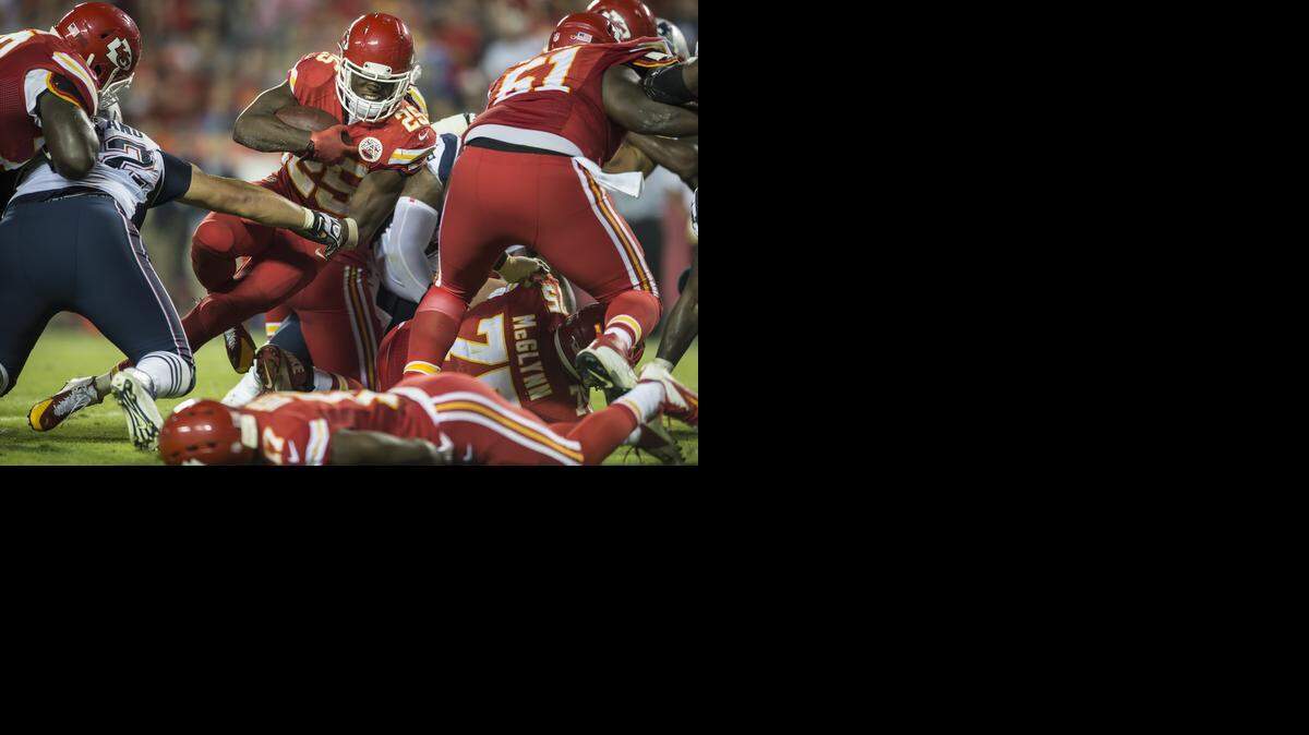 
The Chiefs offensive line cleared plenty of holes for running back Jamaal Charles against the New England Patriots at Arrowhead Stadium in Kansas City, Mo. on Monday night.
