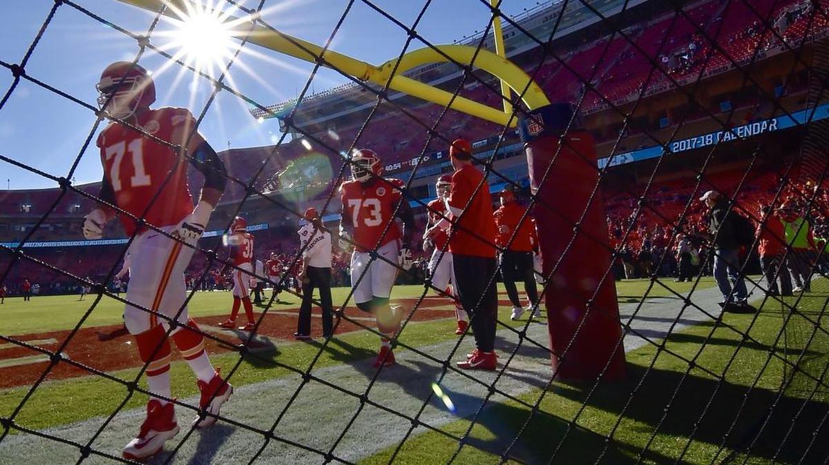 Kansas City Chiefs players run onto the field before a game against the Oakland Raiders on Sunday, Dec. 10, 2017, at Arrowhead Stadium in Kansas City, Mo.