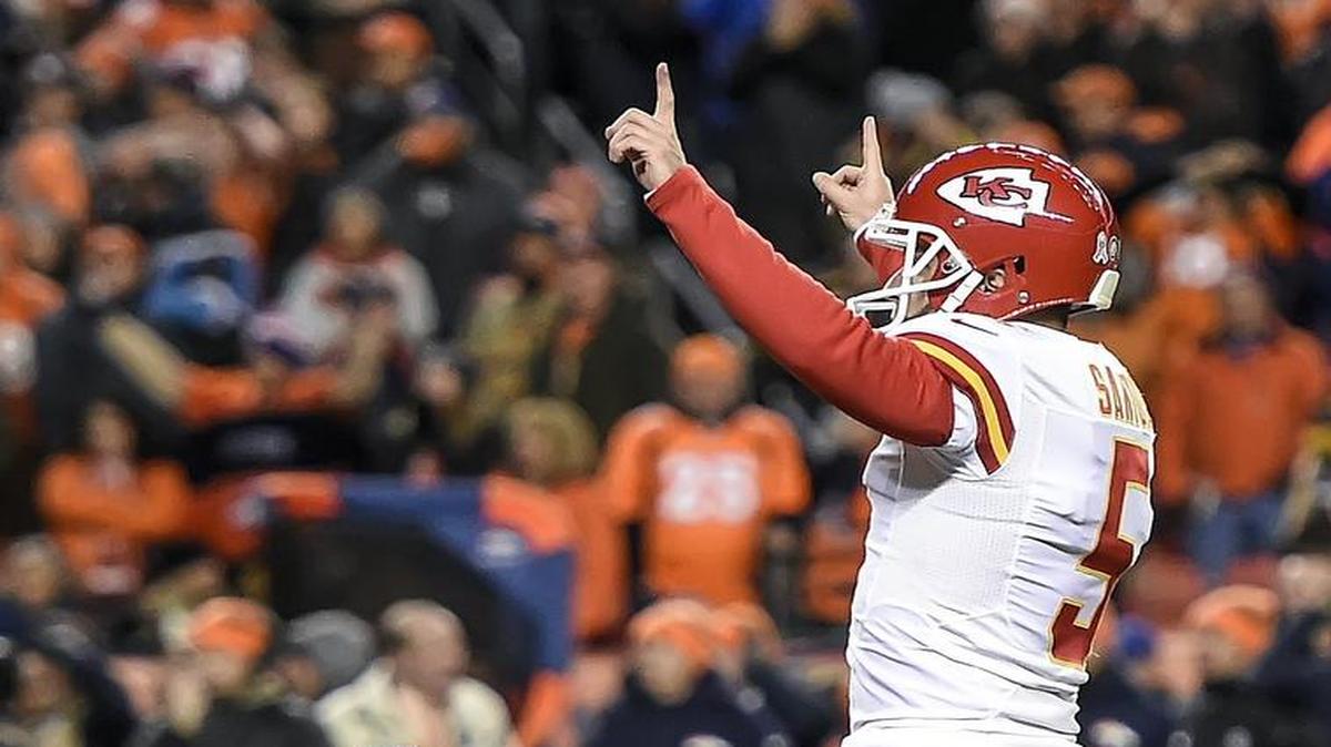 Kansas City Chiefs punter Dustin Colquitt (2) thought the kick missed, but kicker Cairo Santos (5) saw it was ruled good to win the game in overtime over the Denver Broncos, 30-27, on November 27, 2016, at Sports Authority Field at Mile High in Denver.