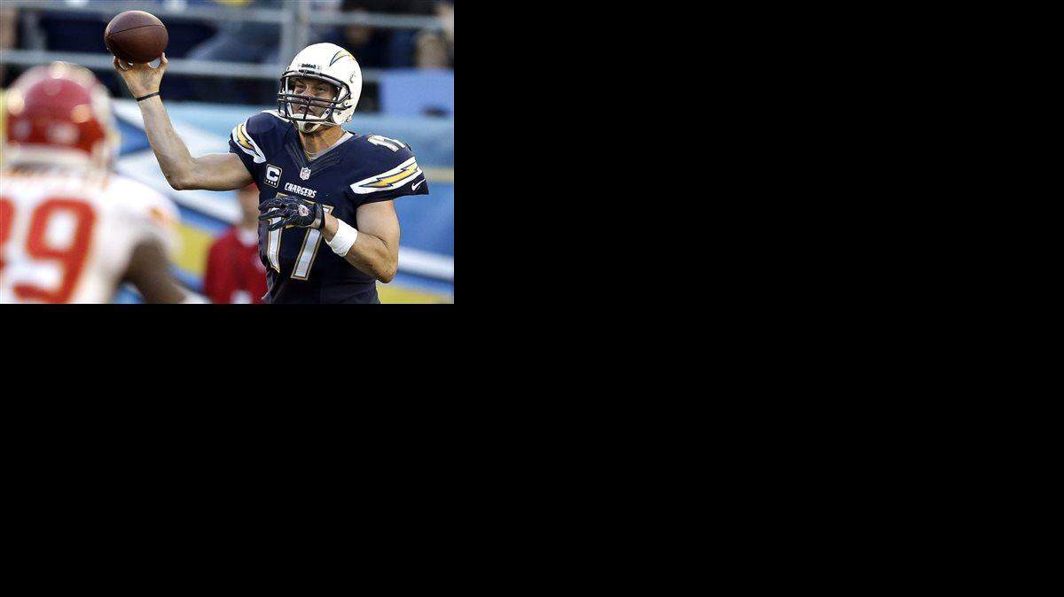 
San Diego Chargers quarterback Philip Rivers fires a short pass during the overtime period against the Kansas City Chiefs on Dec. 29, 2013, in San Diego. The Chargers won 27-24.
