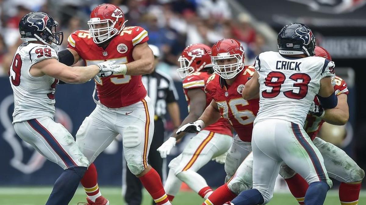 
Kansas City Chiefs offensive tackle Jah Reid (second from left) blocked Houston Texans defensive end J.J. Watt as the rest of the Chiefs’ line worked in pass protection.
