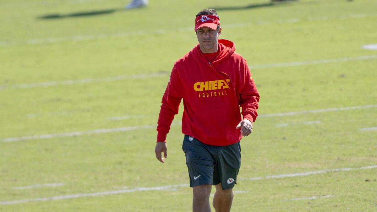 Kansas City Chiefs general manager Brett Veach walks off the field during a Chiefs training camp practice on Tuesday, Aug. 15, 2023, in St. Joseph, Mo.