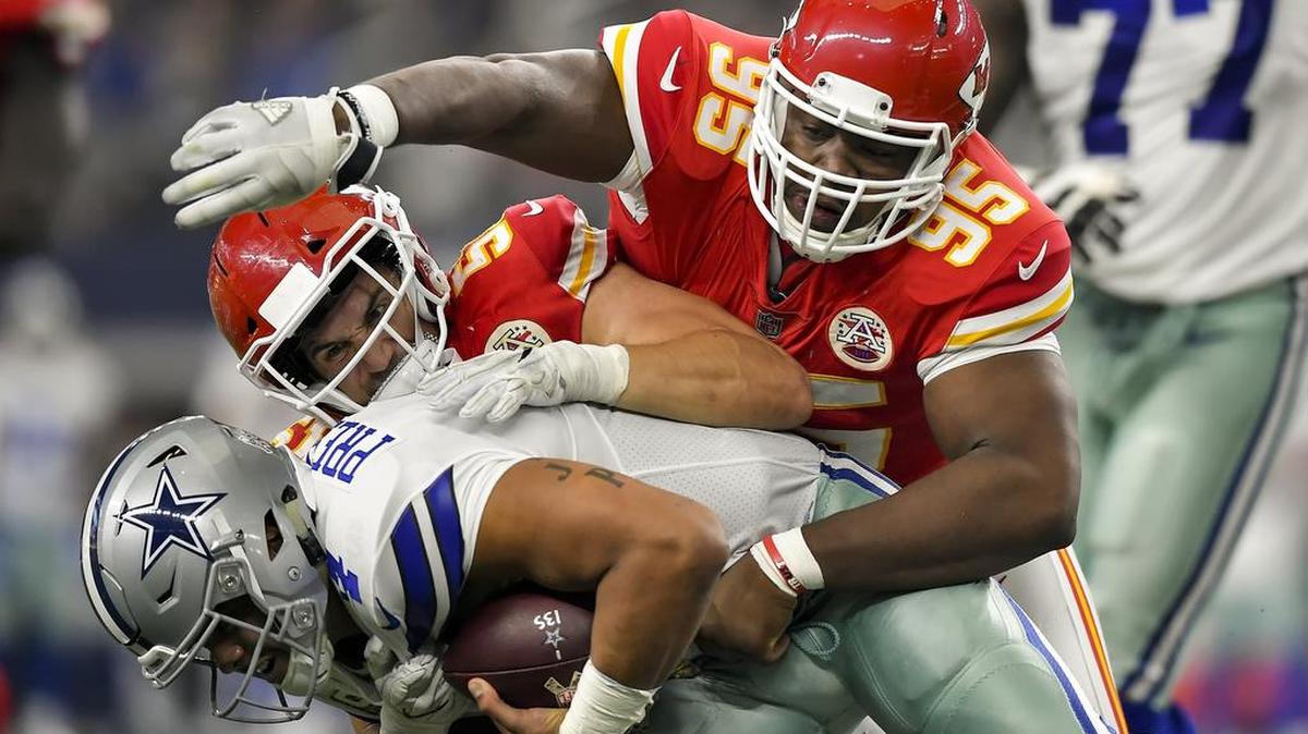 Kansas City Chiefs outside linebacker Frank Zombo (51) and defensive end Chris Jones (95) sacked Dallas Cowboys quarterback Dak Prescott (4) in the second quarter on Nov. 5, 2017, at AT&T Stadium in Arlington, Texas.