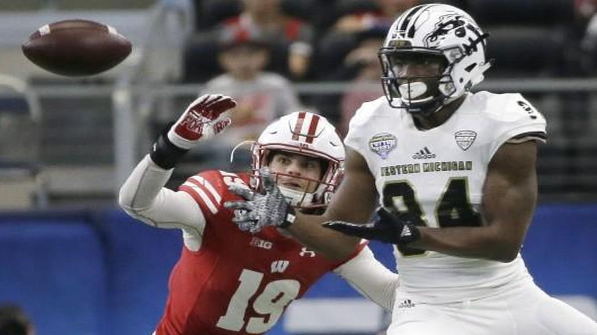 Western Michigan wide receiver Corey Davis caught a pass against Wisconsin safety Leo Musso in the Cotton Bowl.