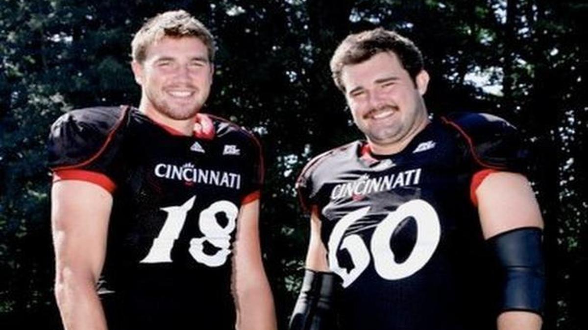 Chiefs tight end Travis Kelce (left) and Eagles center Jason Kelce both played at the University of Cincinnati. They will be on opposing sides in Sunday’s game at Arrowhead Stadium.
