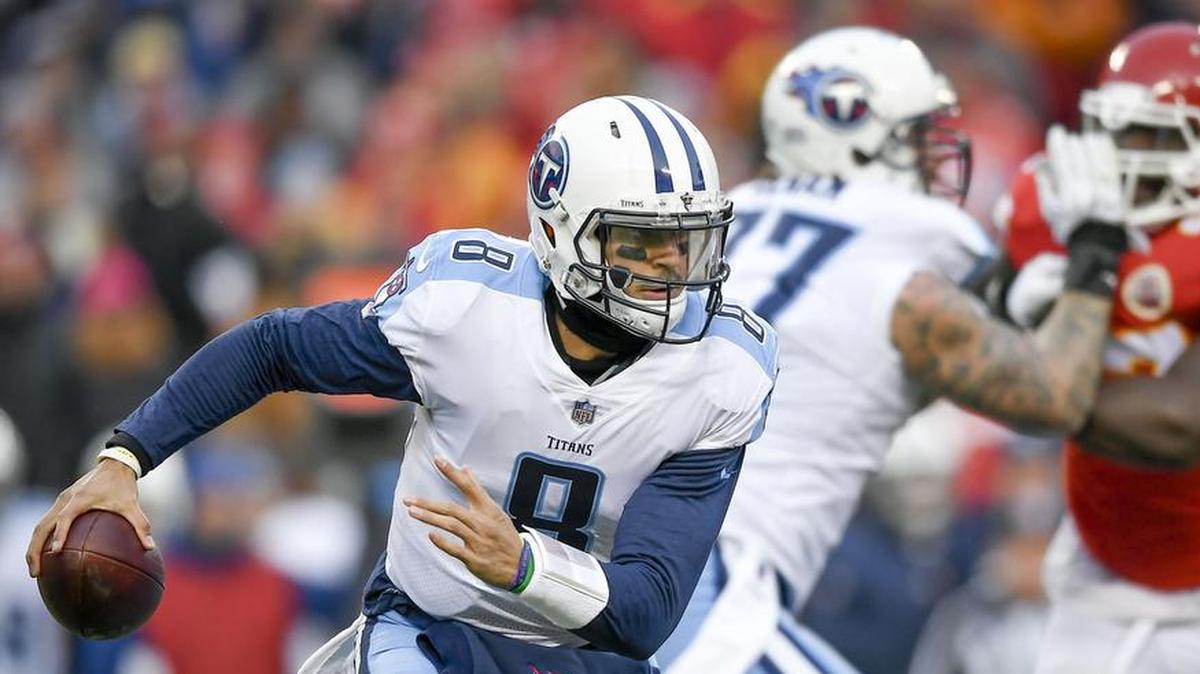 Titans quarterback Marcus Mariota passed for 205 yards and two touchdowns and caught his own deflected pass for a 6-yard touchdown.